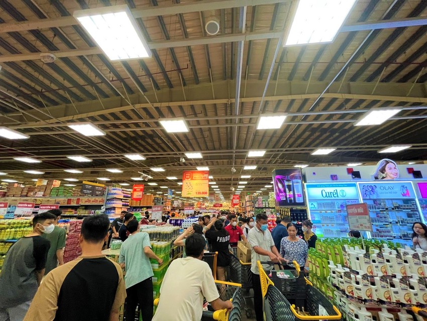 Thị trường đầy gạo, khuyến mãi cao - Ảnh 1.