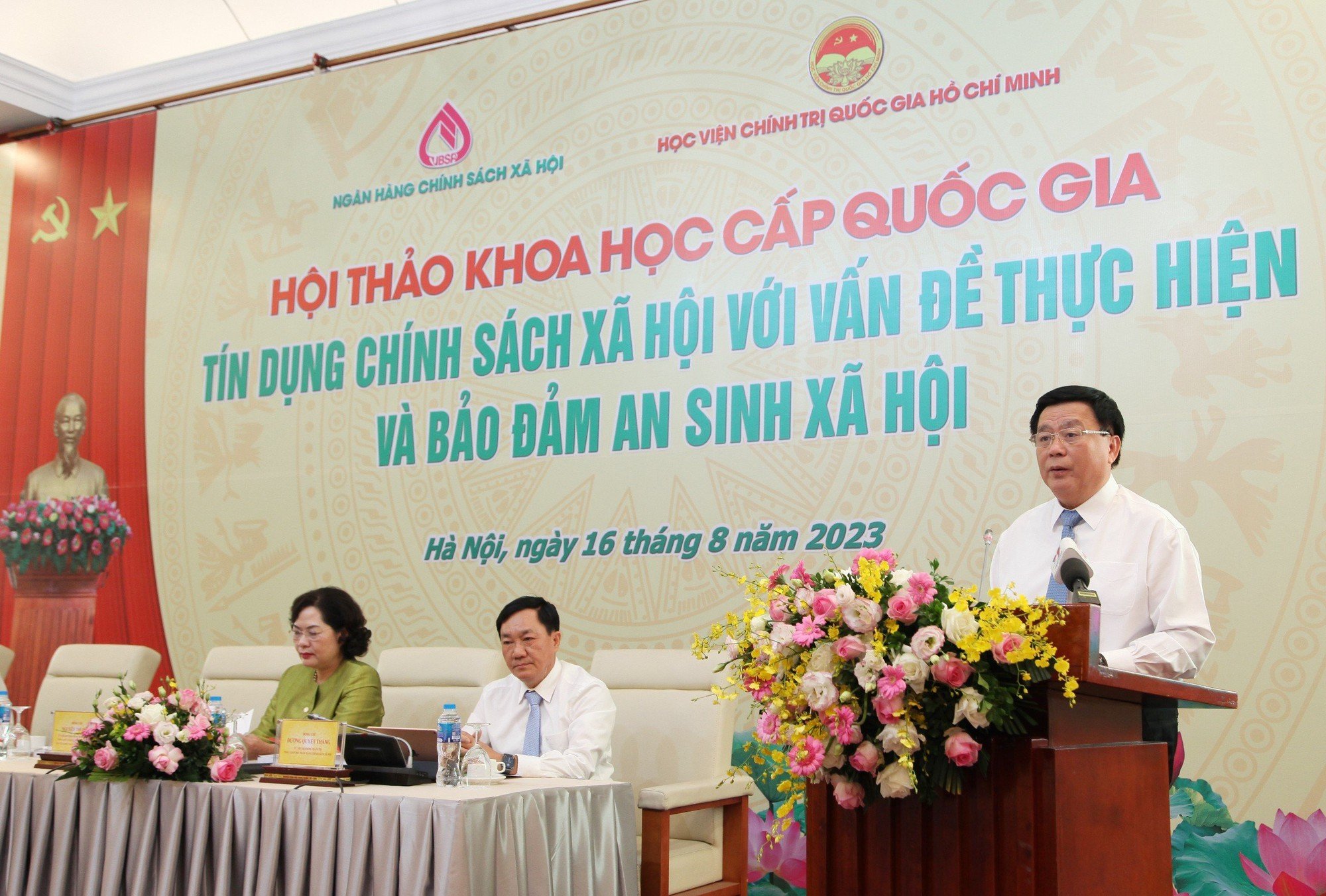 Hội thảo khoa học cấp quốc gia “Tín dụng chính sách xã hội với vấn đề thực hiện và bảo đảm an sinh xã hội”. - Ảnh 1.
