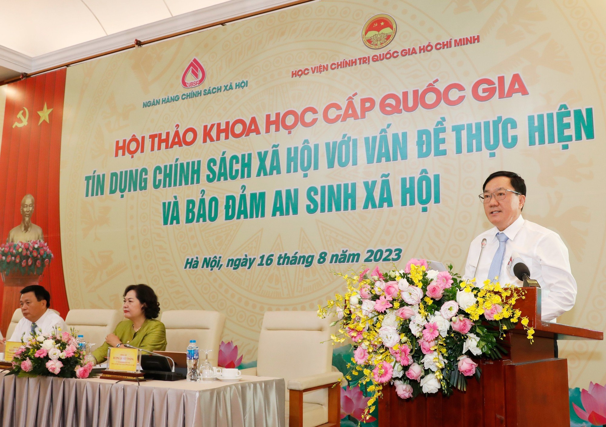 Hội thảo khoa học cấp quốc gia “Tín dụng chính sách xã hội với vấn đề thực hiện và bảo đảm an sinh xã hội”. - Ảnh 3.