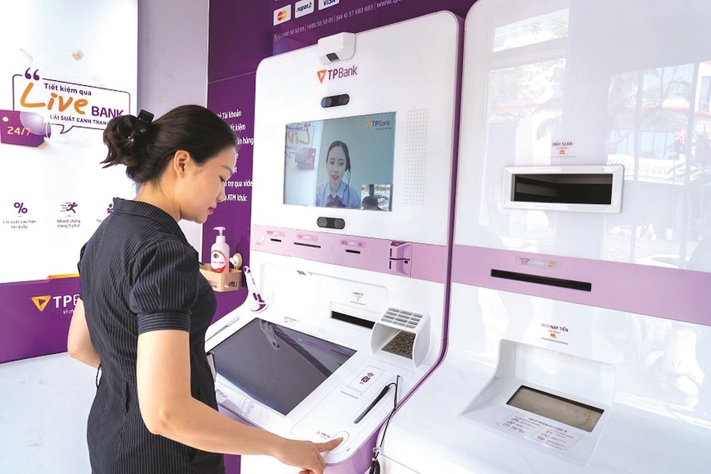 "Cởi trói" để ngân hàng đẩy mạnh cho vay trực tuyến - Ảnh 2. "Cởi trói" để ngân hàng đẩy mạnh cho vay trực tuyến - Ảnh 2.