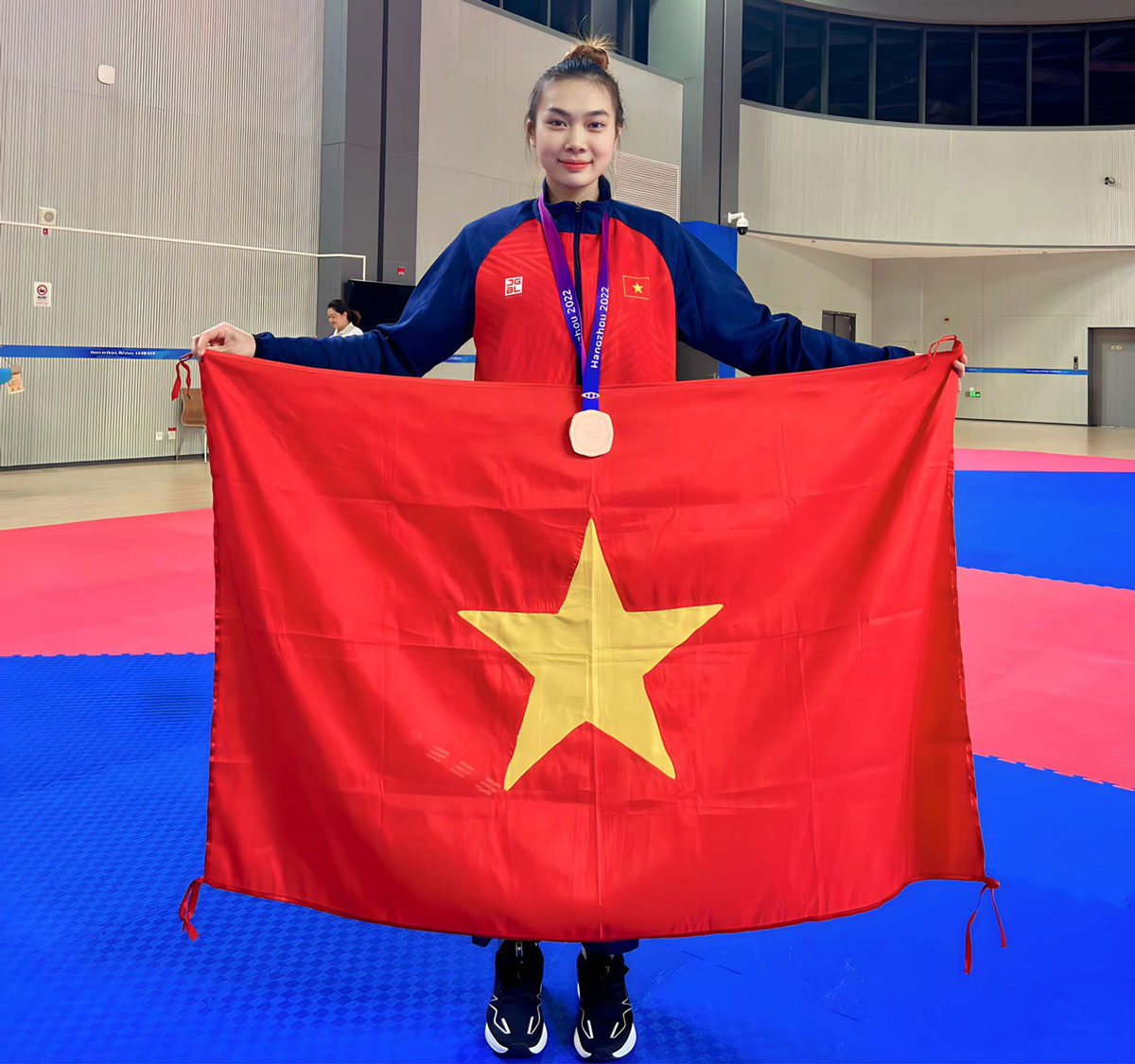 Chân dung nữ võ sĩ xinh đẹp của đoàn TTVN tại ASIAD 2023 - Ảnh 4.