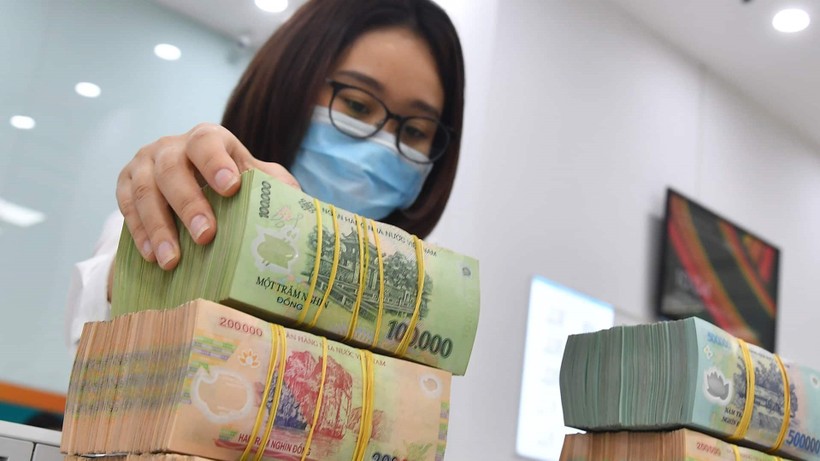 Tiền to có thể được bơm trở lại hệ thống trong vài tuần tới - Ảnh 1.