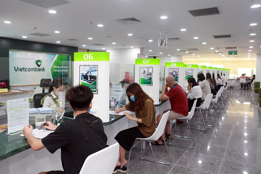 Vietcombank cho khách vay lãi 6,9% để trả nợ ngân hàng khác, BIDV lập tức công bố cho vay &quot;y hệt&quot; với lãi chỉ 6% - Ảnh 1.