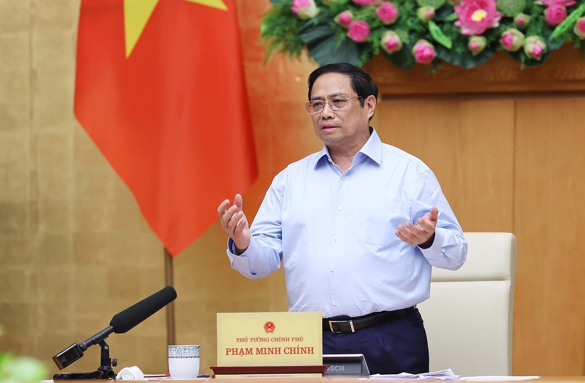 Thủ tướng: Chính phủ kiên quyết không lùi bước trước khó khăn - Ảnh 1.