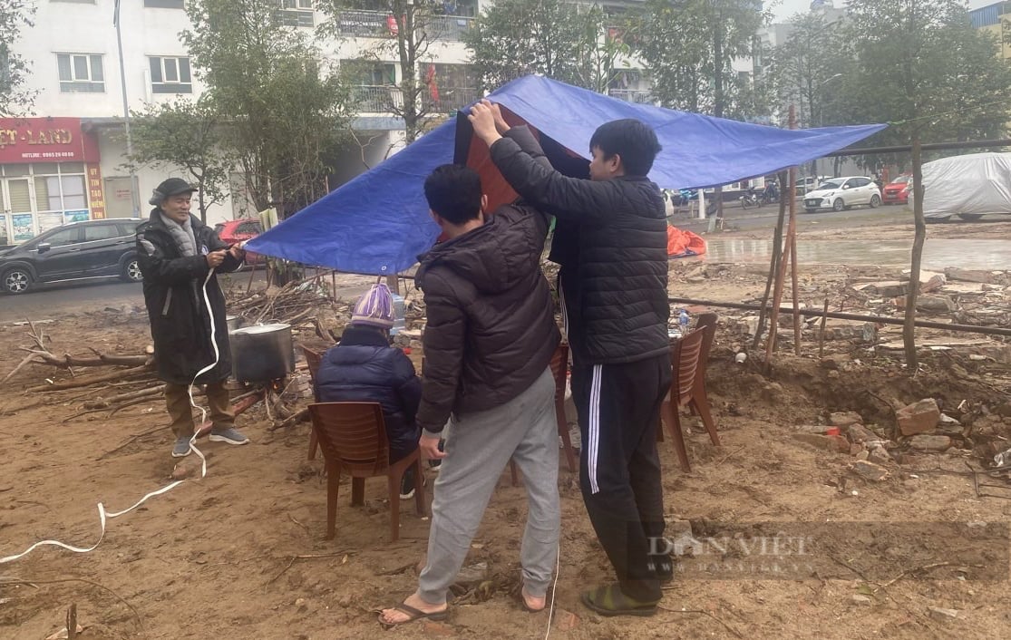 Người Hà Nội mổ lợn, góp gạo, trắng đêm canh bánh chưng đón Tết sớm- Ảnh 3.