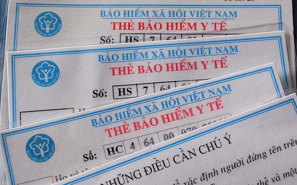 Thân nhân cán bộ, chiến sỹ công an có phải mua bảo hiểm y tế khi đi làm tại doanh nghiệp?