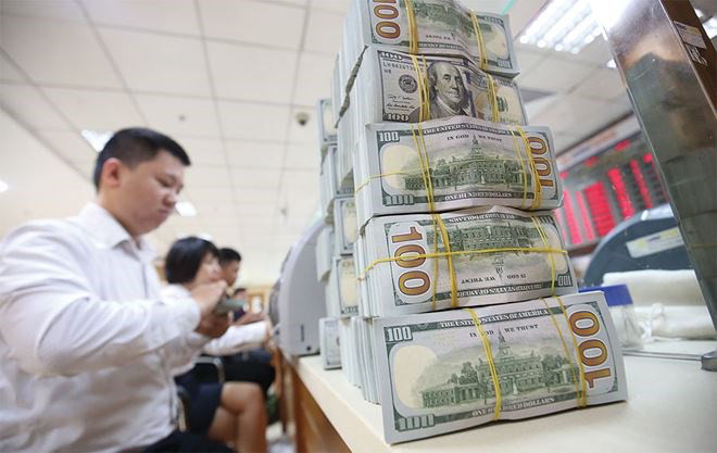 Sẽ chấm dứt cho vay bằng ngoại tệ để chống đô-la hóa - Ảnh 1. Sẽ chấm dứt cho vay bằng ngoại tệ để chống đô-la hóa - Ảnh 1.