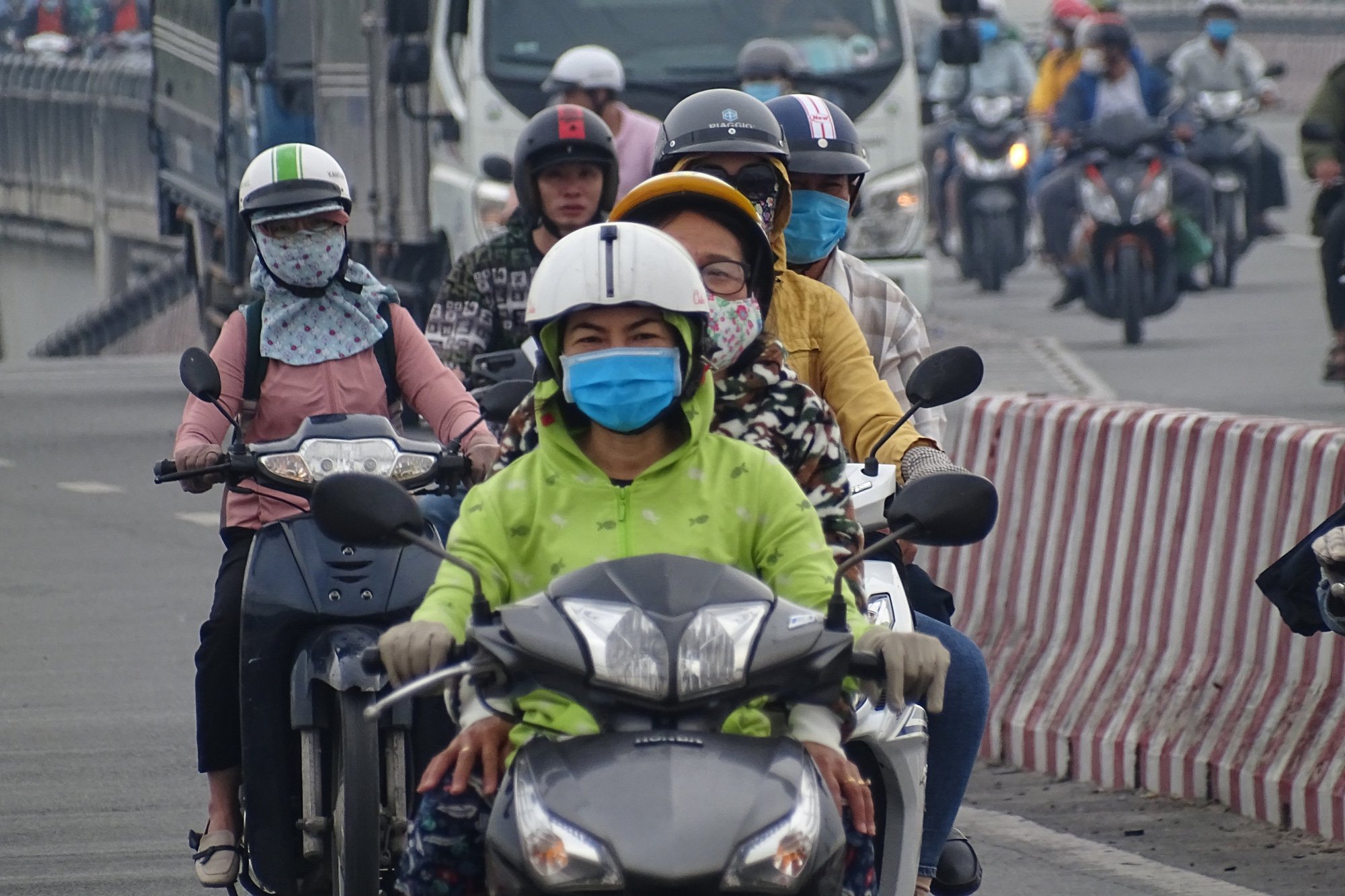 Nhiệt độ ở TP.HCM có thể xuống 18 độ C lúc sáng sớm vài ngày tới - Ảnh 1.