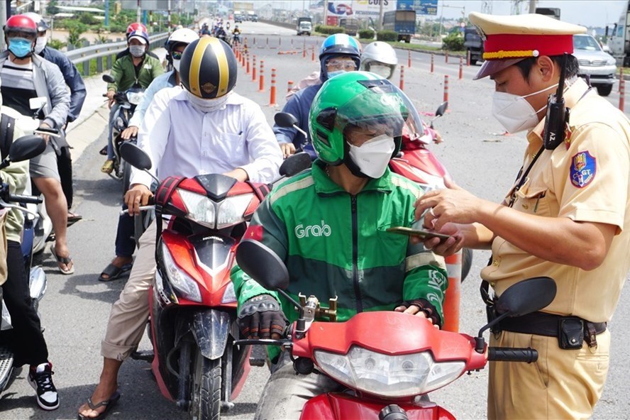 Quy định rõ, người dân dễ đi lại hơn - Ảnh 1. Quy định rõ, người dân dễ đi lại hơn - Ảnh 1.