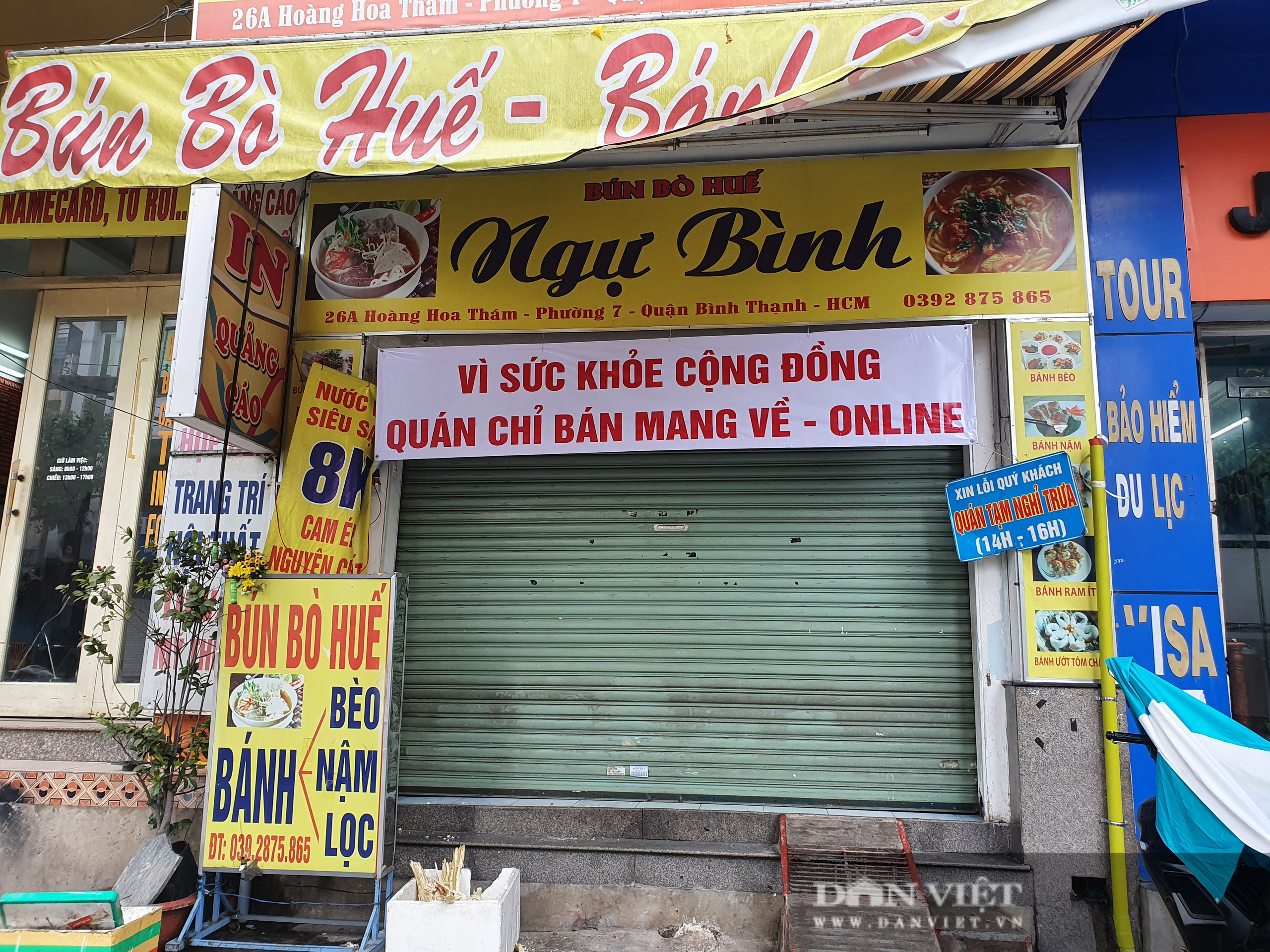Hàng quán, tiệm hớt tóc tại TP.HCM đóng cửa sớm vì 36 ca nghi mắc Covid-19 - Ảnh 5.