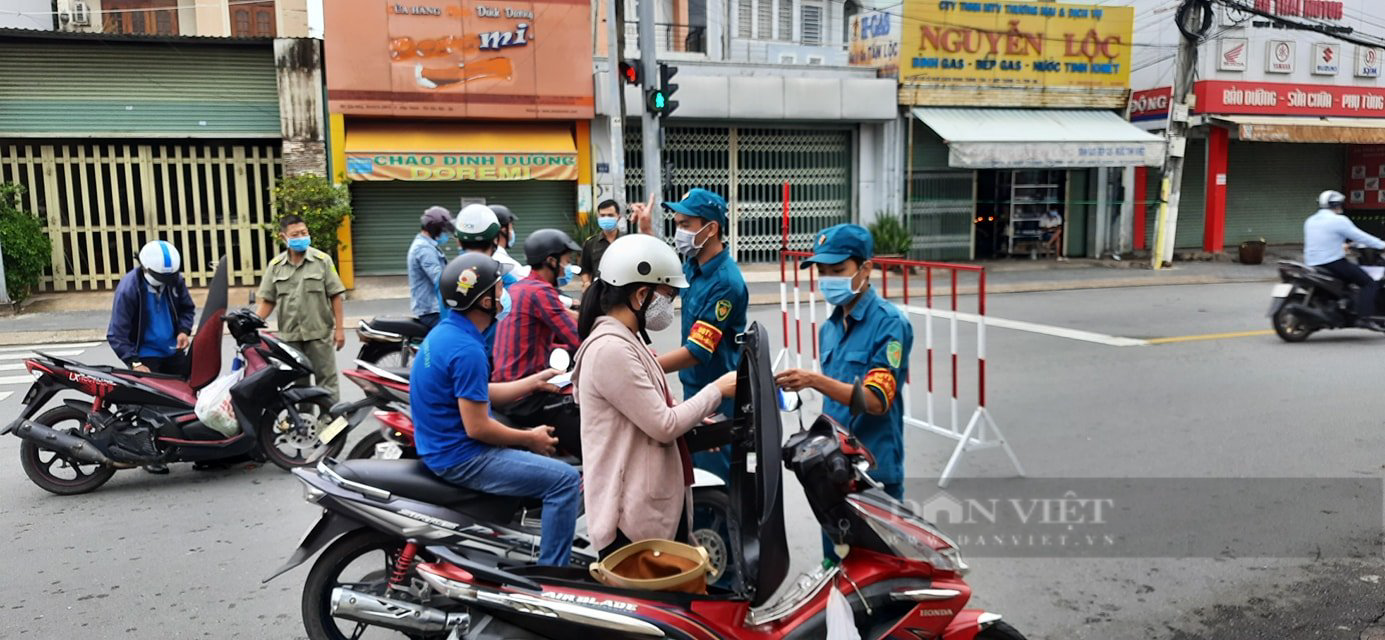 Bình Dương: Người từ địa bàn nguy cơ cao sang địa bàn nguy cơ thấp phải xét nghiệm 3 lần, cách ly 14 ngày - Ảnh 1.
