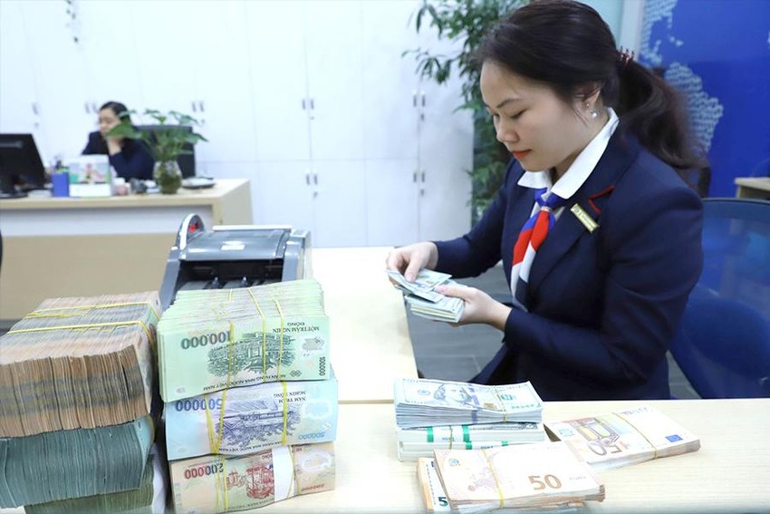 Thở phào nhờ giá USD đã vượt qua tâm bão - Ảnh 2.