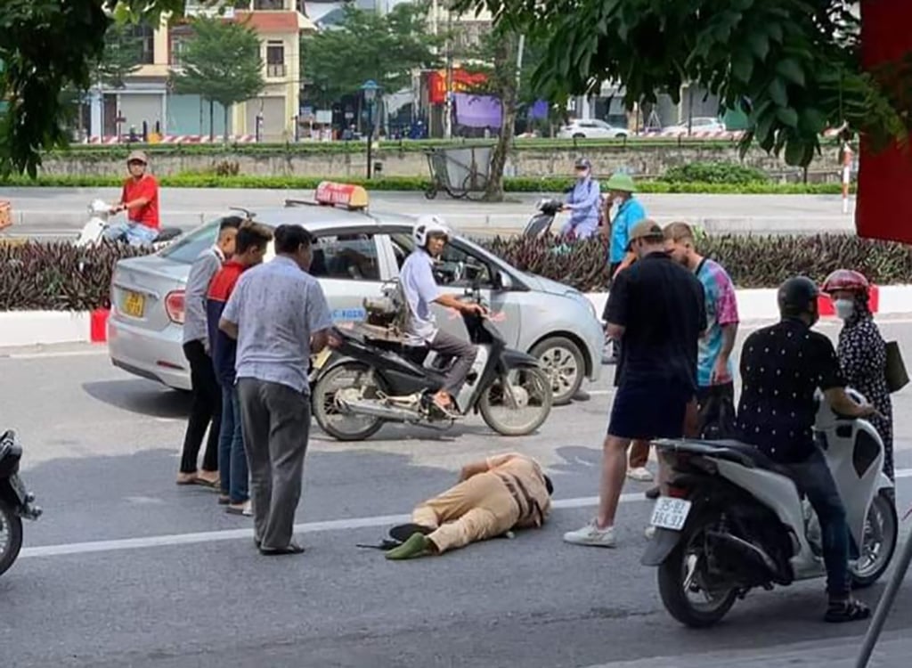 Thanh niên Thanh Hóa vượt đèn đỏ đâm gãy chân thiếu tá CSGT Ninh Bình có thể bị xử lý ra sao? - Ảnh 1.