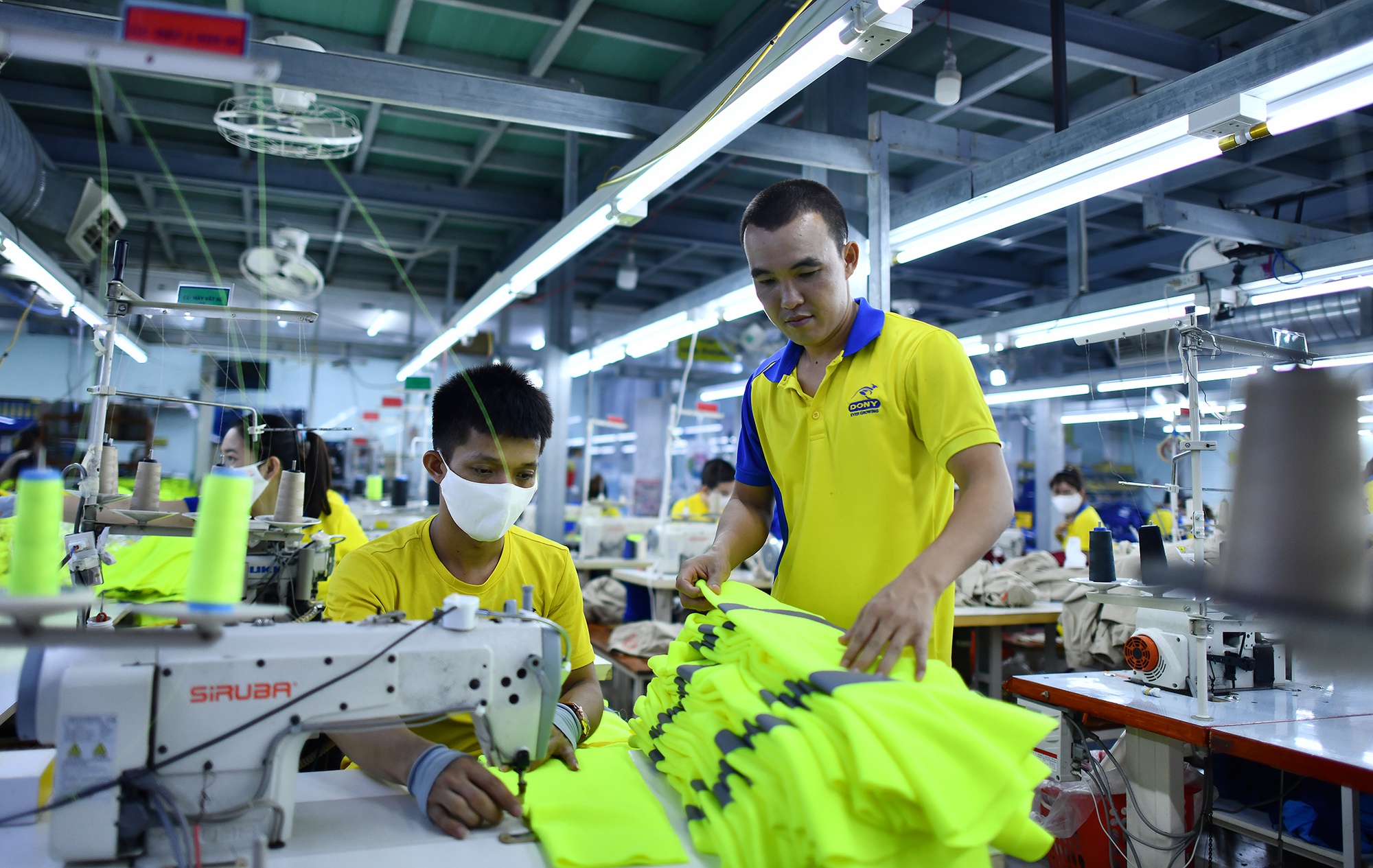 Doanh nghiệp tất bật vào &quot;guồng&quot; sau Tết - Ảnh 1.