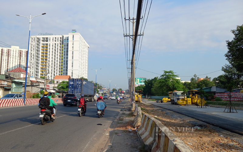 Tỉnh Bình Dương tiếp tục đền bù giải phóng mặt bằng thi công đường  Quốc lộ 13. Ảnh: Nguyên Vỹ