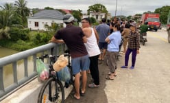 Một phụ nữ nghi nhảy cầu tự tử vì bệnh tật