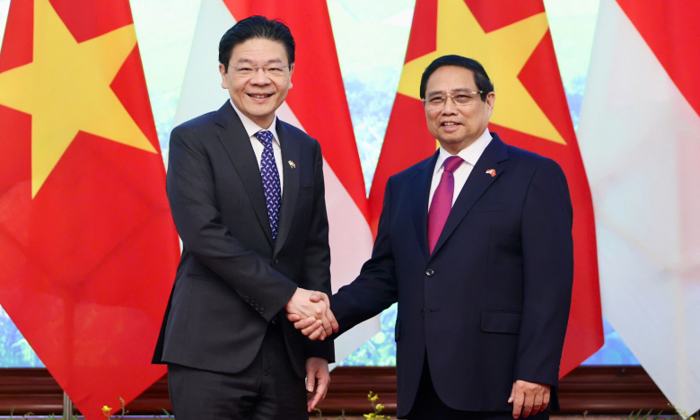 Hình ảnh Thủ tướng Phạm Minh Chính chủ trì lễ đón Thủ tướng Singapore tại Hà Nội